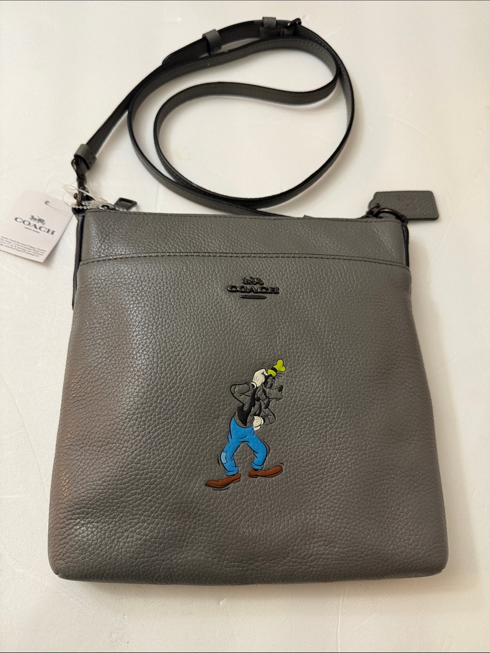 Coach Gray Pebbled Leather Men’s Crossbody with Goofy Graphic